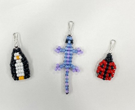Penguin, lizard and ladybug made out of braided beads